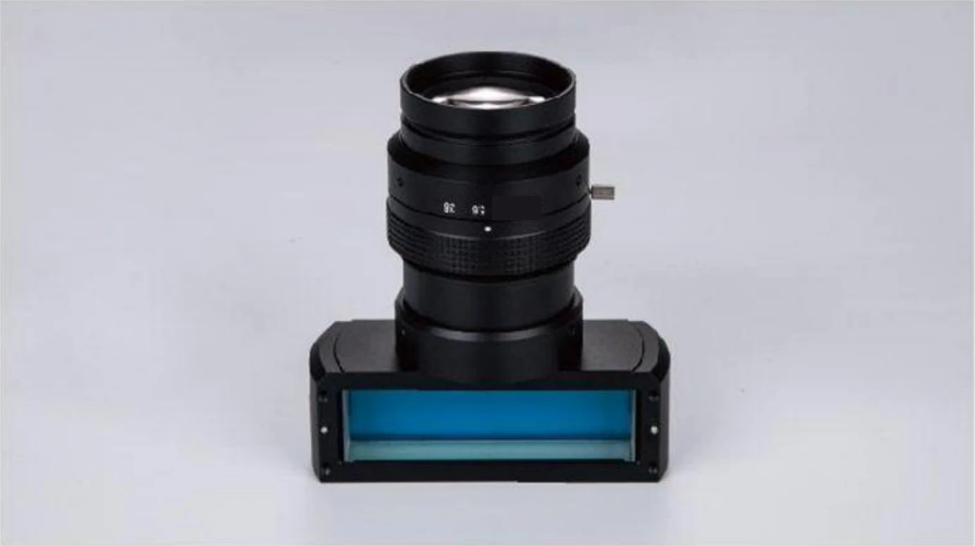Coaxial illumination line scan lens